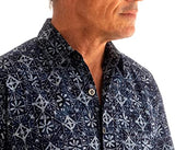 A man wearing Andorra Skies Blue print. Blue Hawaiian Batik Shirt, Men's Button Down Shirt Style.