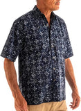 A man wearing Andorra Skies Blue print. Blue Hawaiian Batik Shirt, Men's Button Down Shirt Style.